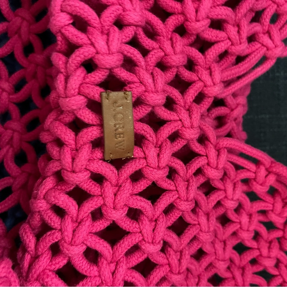 New with tags, pink crocheted bag